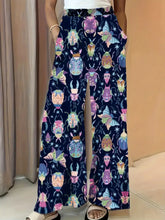 Dark blue printed wide leg pants with colorful beetle and butterfly pattern on starry night sky background