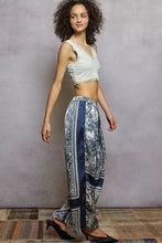 Blue and white floral printed woven wide leg silk pants with side stripe detail and drawstring waist