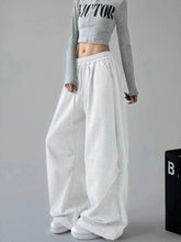 White oversized wide leg drawstring sweatpants with elastic waistband for comfortable casual wear