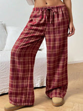 Red and beige plaid wide leg pants with elastic waistband and drawstring for comfortable loungewear