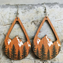 Teardrop shape dangle earrings with wooden mountain landscape and forest design