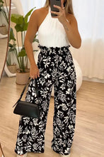 Black and white floral print full size printed high waist wide leg pants with a high-waisted design