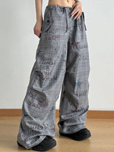 Gray drawstring plaid wide leg pants featuring a comfortable fit and stylish wide leg design for casual wear