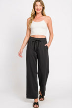 Black zenana scuba drawstring pants featuring wide-leg design with drawstring waist and side pockets in scuba material