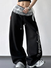 Black wide leg loose fit drawstring sweatpants with sheer lace waistband trim and embroidered side seam text
