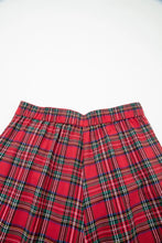 Red plaid wide-leg pants with green and white striped plaid pattern and elastic waistband for comfortable wear