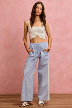 Light blue and white wide check pants with drawstring waistband and side lace trim in wide leg fit