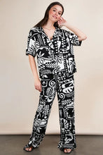 Black and white printed casual wide leg resort pants with short sleeves in tropical pattern pajama set