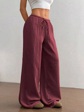 Full size drawstring wide leg maroon textured cotton wide-leg pants with a comfortable drawstring waistband