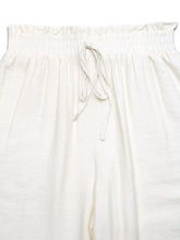 Cream-colored wide leg pants with pockets featuring a perfect fit loose elastic waistband and matching drawstring
