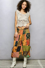 Pol printed patchwork wide leg pants featuring vibrant orange green printed patchwork fabric with adjustable drawstring cuffs