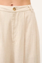 Beige wide leg linen blended pants with subtle texture and a gold toned button at the waistband by and the why