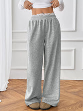 Gray heathered wide leg casual pants with delicate lace trim at the waistband for comfortable everyday wear