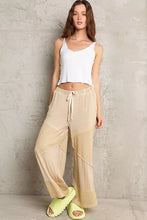 Beige pol elastic waistband wide leg pants with drawstring and patchwork detailing for comfortable wear