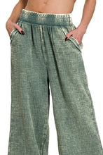 Sage green zenana washed double gauze pants feature a textured woven pattern and an elastic waistband for comfort