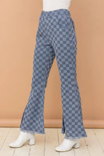 Blue and gray checkered denim bell pants with frayed hems featuring a high waist checkerboard high waist design