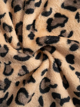 Leopard wide leg plush pants in tan and black leopard print faux fur blanket material for cozy wear