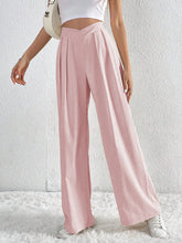 Soft pink high waist wide leg pants with ruched front and pleated detail for a stylish wide leg look