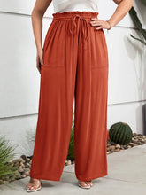 Plus size high waist wide rust orange cropped pants with elastic waistband and drawstring for comfortable wear