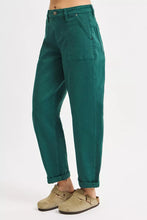 Emerald green high rise ankle cuffed cargo pants with rolled cuffs and a barrel silhouette for casual wear