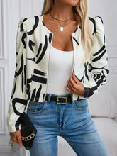 Cream and black abstract print bomber jacket with puff sleeves