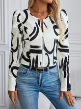 White and black abstract print zip-up blazer jacket with puffed sleeves