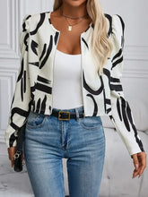 White and black abstract print blazer jacket with puffed sleeves
