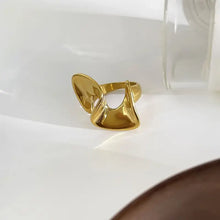 Polished 18K gold-plated abstract wave ring in stainless steel
