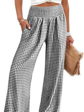 Black and white gingham high waist wide leg pants with elastic waistband for a comfortable fit