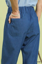 Umgee denim wide leg crop pants in blue denim with a relaxed fit and two front pockets for casual wear