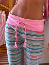Pink and multicolored drawstring striped pants with matching pink waistband in soft comfortable fabric