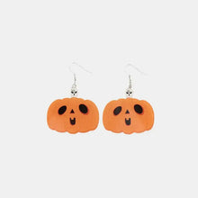 Acrylic alloy pumpkin shape earrings with jack-o-lantern faces and skull accents