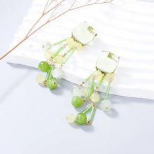 Acrylic bead dangle earrings with square milky-white tops and colorful bead tassels