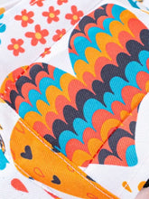 Vibrant pet bucket hat with adjustable chin strap and colorful wave pattern