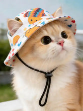 White pet bucket hat with chin strap, colorful birds and hearts