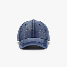 Blue adjustable cotton baseball cap with distressed denim stitching