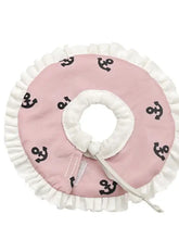 Pink adjustable pet collar with black anchors and white ruffles