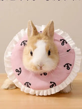 Pink ruffled adjustable pet collar with black anchor patterns