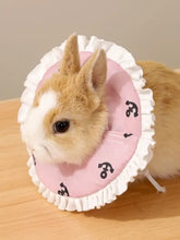 Pink and white ruffled adjustable pet collar with black anchors