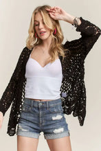 Black Adora Crochet Cardigan with pearl embellishments, scallop hem, and delicate crochet detailing