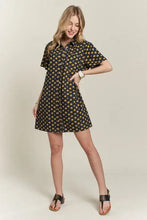 Adora floral button-up mini denim dress in navy blue with short sleeves and small yellow flower pattern