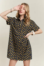 Navy blue mini denim dress with short sleeves and yellow daisy floral button up design adora denim dress