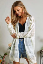 Adora lightweight knit cardigan with open-stitch pattern on woman
