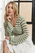 Adora long sleeves crochet knit sweater in green and white stripes on woman