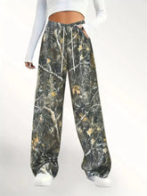 Relaxed fit camo print wide-leg pants with drawstring waist and side pockets for casual wear