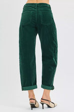 Dark green high rise crop barrel corduroy pants with rolled cuffs made from soft corduroy material