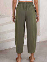Olive green full size drawstring wide leg cropped pants with elastic waistband and subtle vertical seam detailing