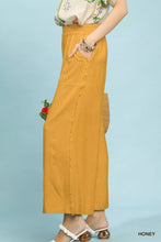 Umgee linen honey-colored wide leg pants with a relaxed fit frayed hem and functional side pockets