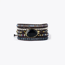 Multi-layered agate beaded bracelet with black onyx, natural stones, and leather