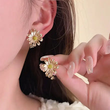 Gold alloy drip oil flower stud earrings with daisy design
